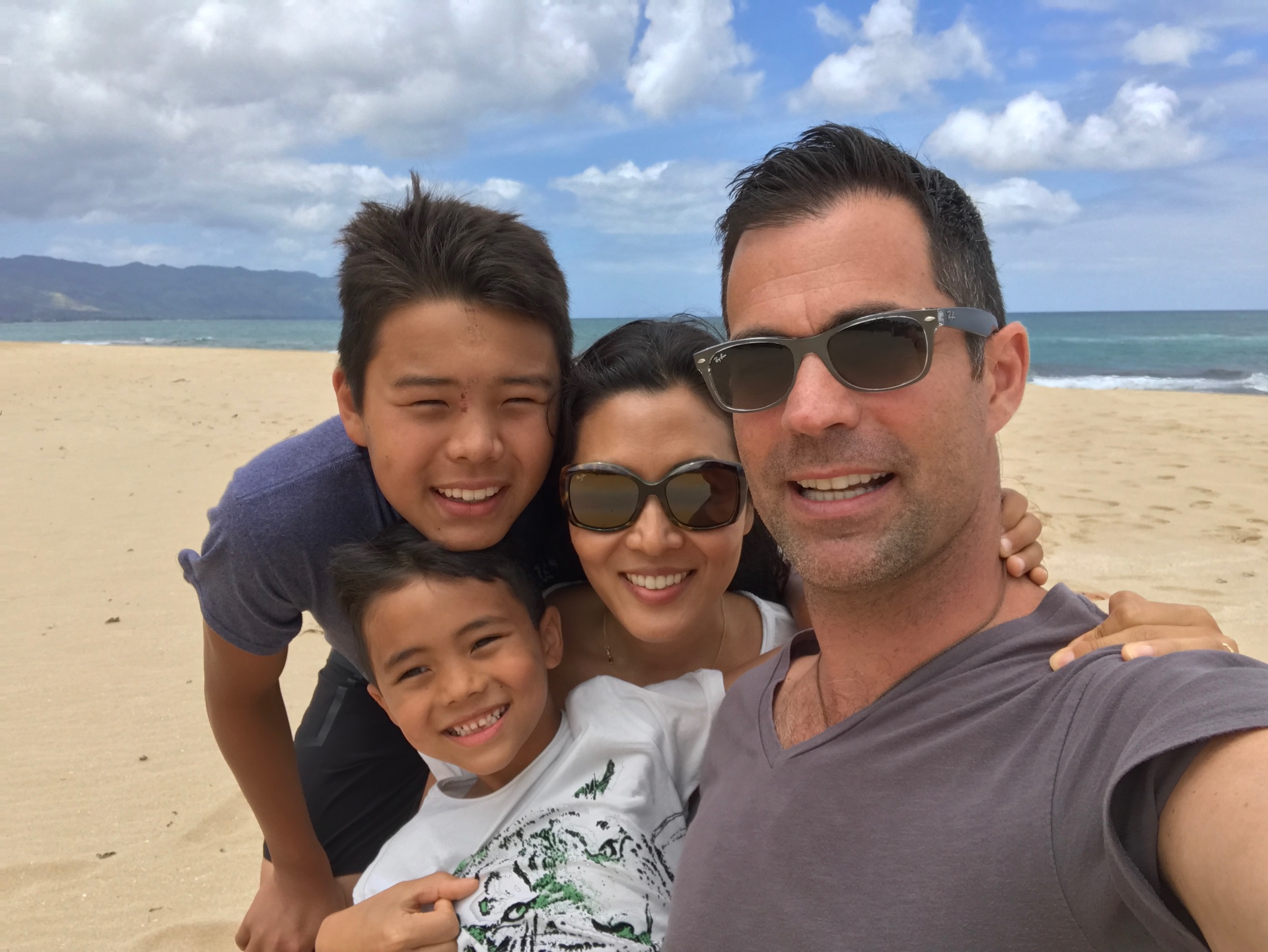 John O'Connor with his family on the beach